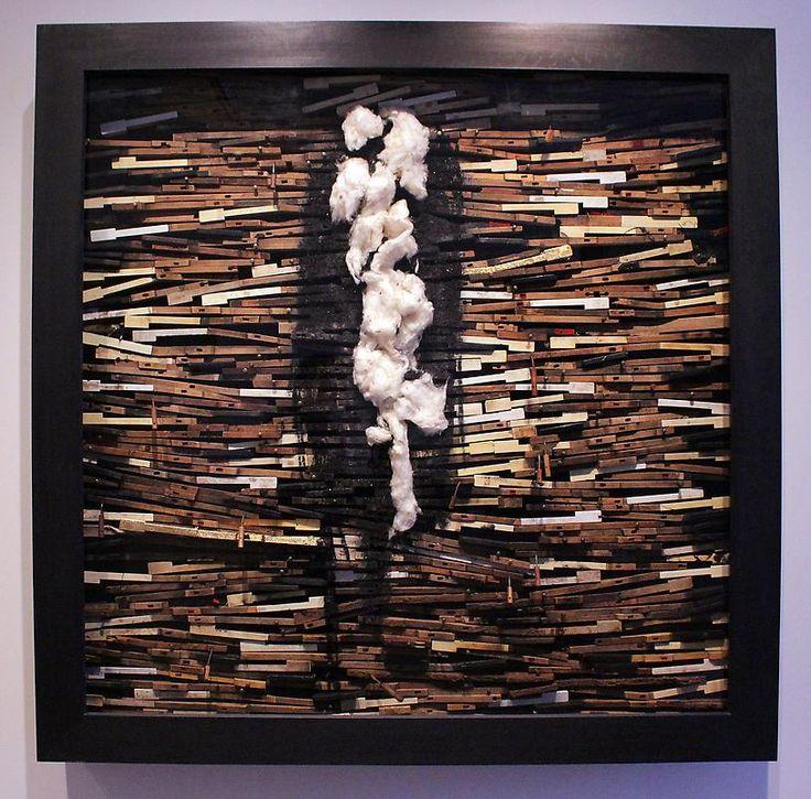 Radcliffe Bailey’s From the Cabinet: Fire Music, composed of piano keys, cotton and charcoal